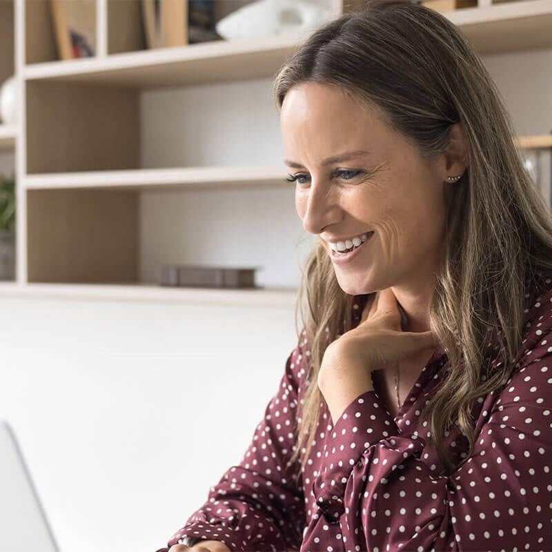 Woman on computer researching treatments
