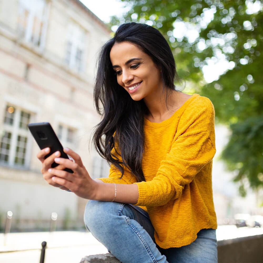 Smiling Woman on her Phone